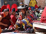 Mustang Lo Manthang Tiji Festival Day 3 06-1 Dorje Jono Sprinkles Salt On The Effigy Of His Demon Father